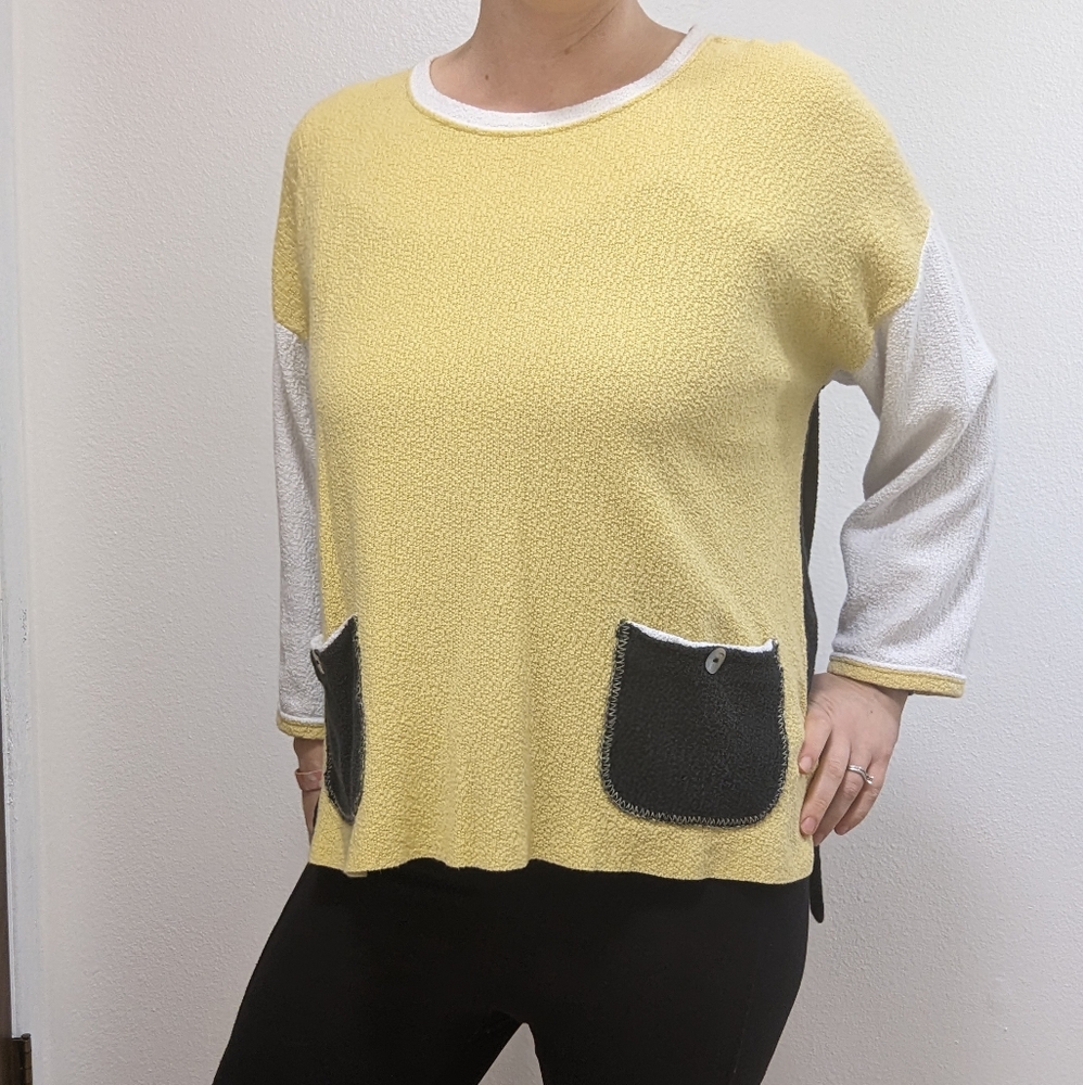 Yellow color blocked top.